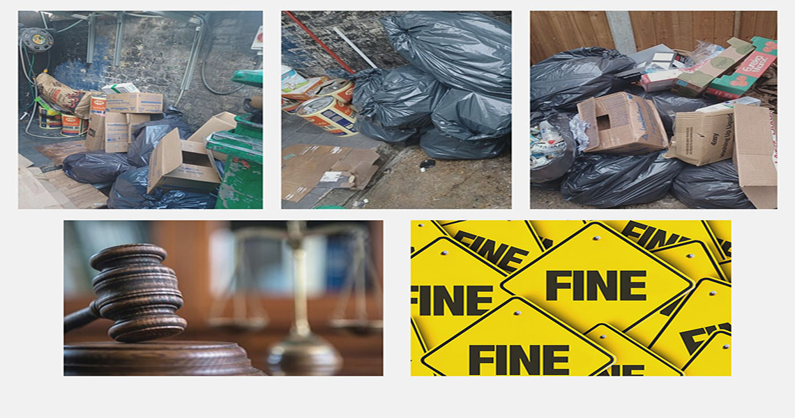 image of black bags of waste blocking building and placed on the wall. 